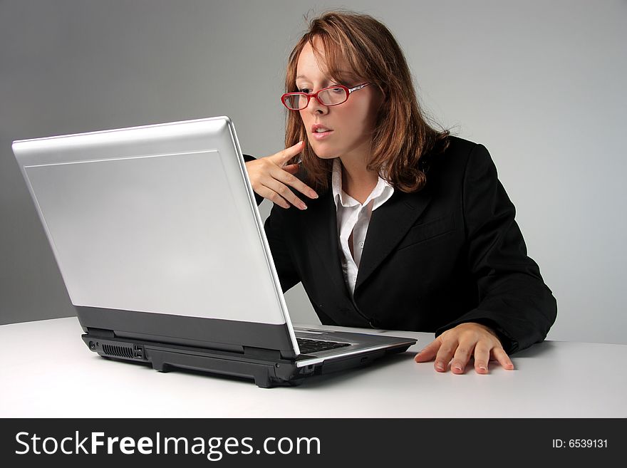 A young woman at computer. A young woman at computer