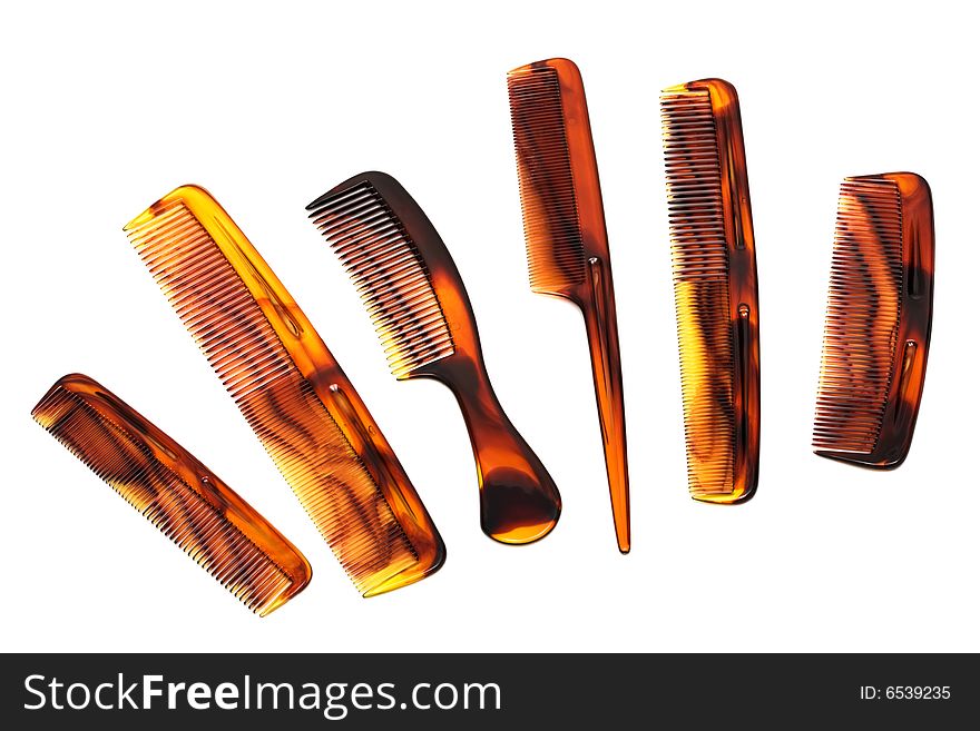 Set of beautiful hairbrushes on a white background