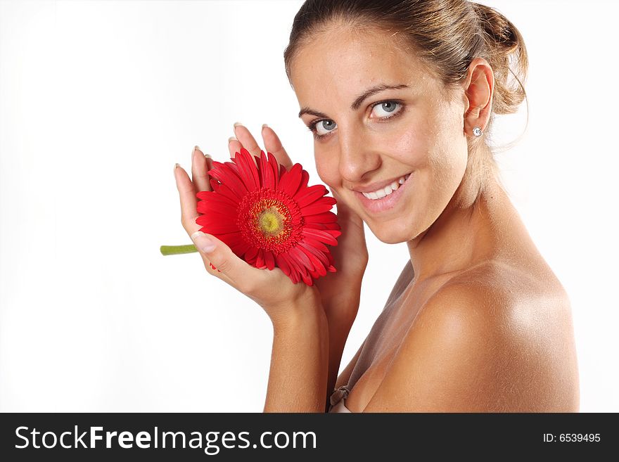 Beautiful woman with flower isolated on white