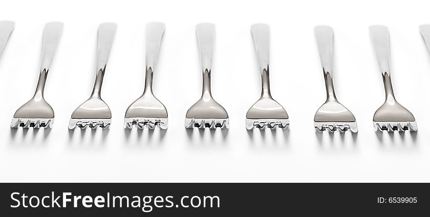 Forks on a white table