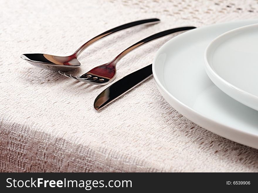 Flatware on a table with cloth