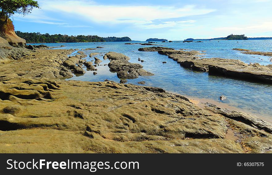 Rough rocky sea beach shore of Wandoor, Port Blair, Andaman and Nicobar Islands, India, Asia.