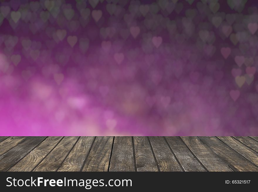 Wooden deck table with foliage bokeh background.Template mock up for display of your product