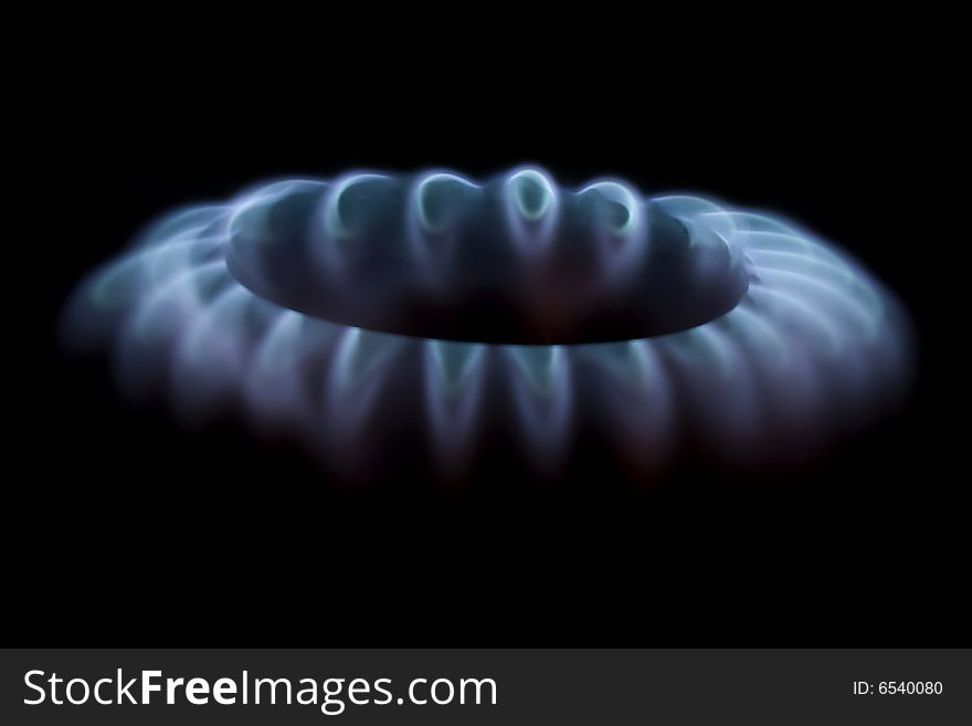 Blue flame of a burning gas cooker