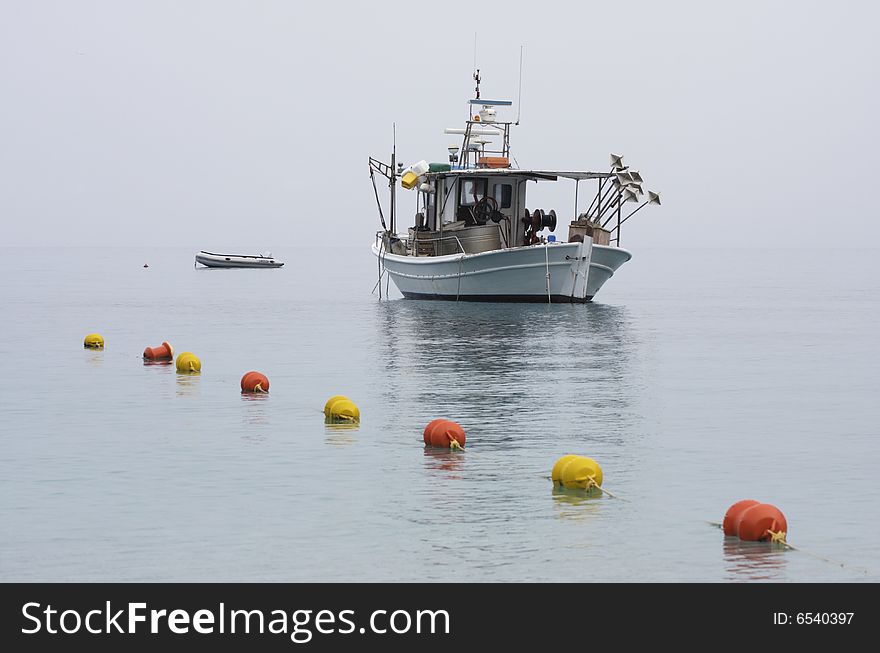 Fishermen S Boat In Calm