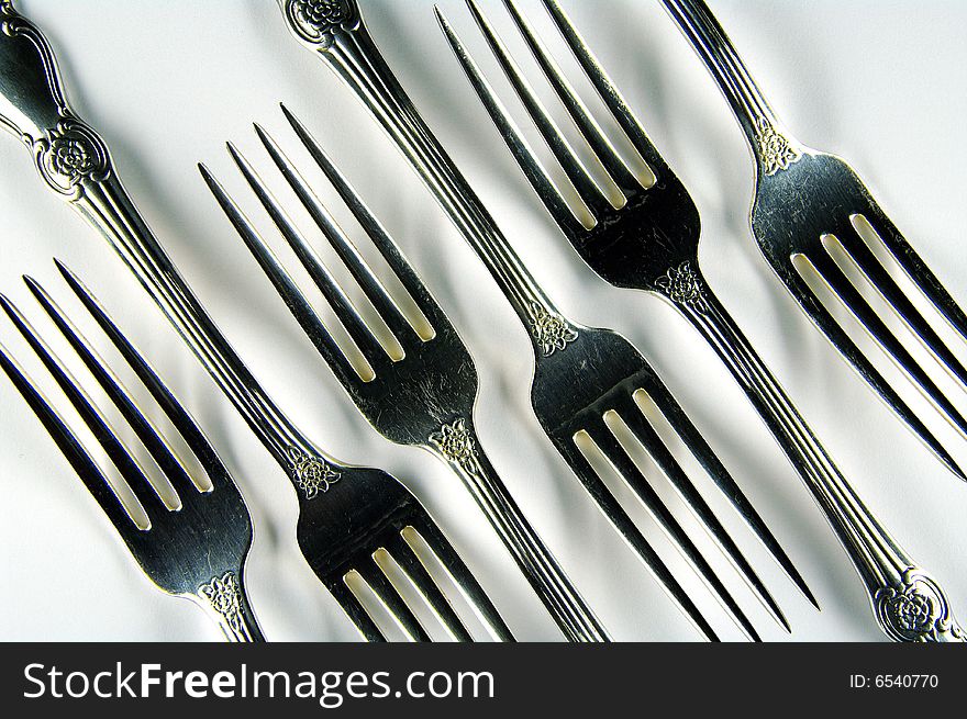 Kitchen Utensil. Six forks on a white background. Kitchen Utensil. Six forks on a white background.