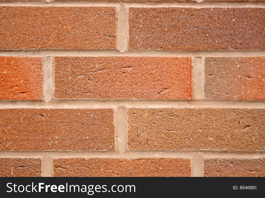 A section of red brick wall for use as background or texture