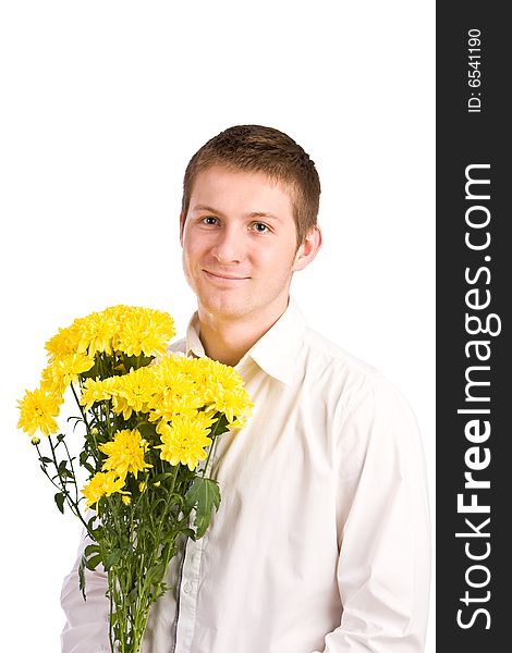 The man with a bouquet of yellow flowers. The man with a bouquet of yellow flowers