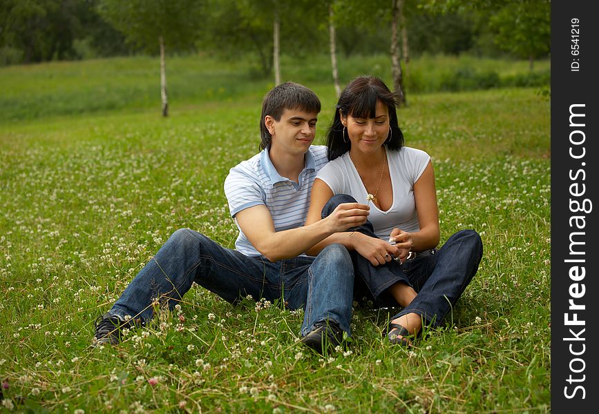 Rest of a happy loving couple in park. Rest of a happy loving couple in park