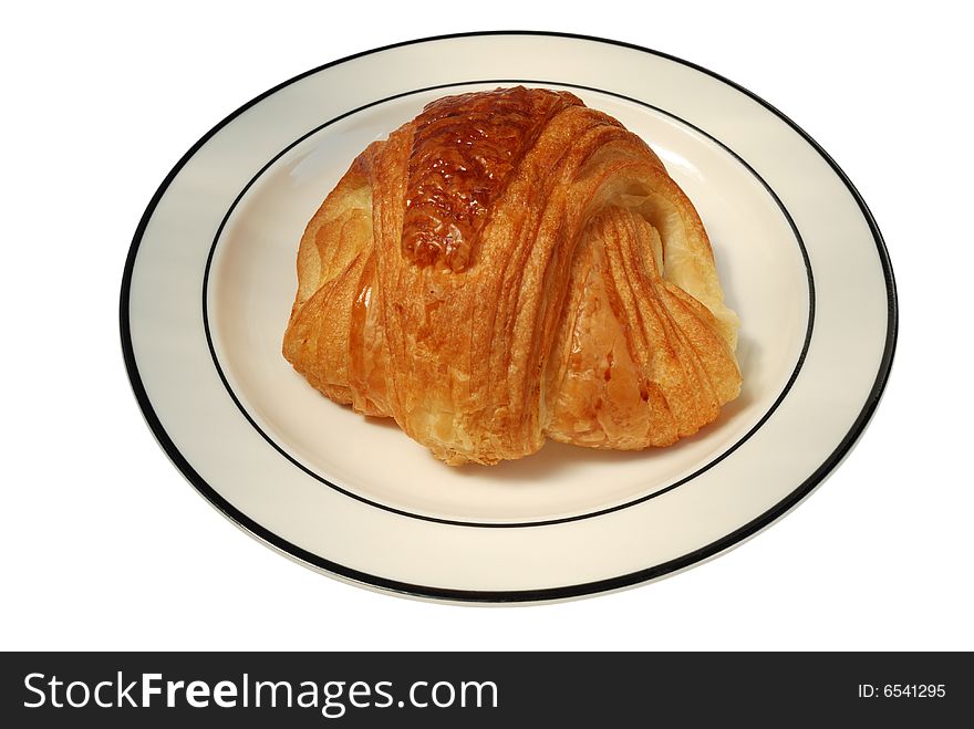 Brioche on plate isolated on white with clipping path on the plate