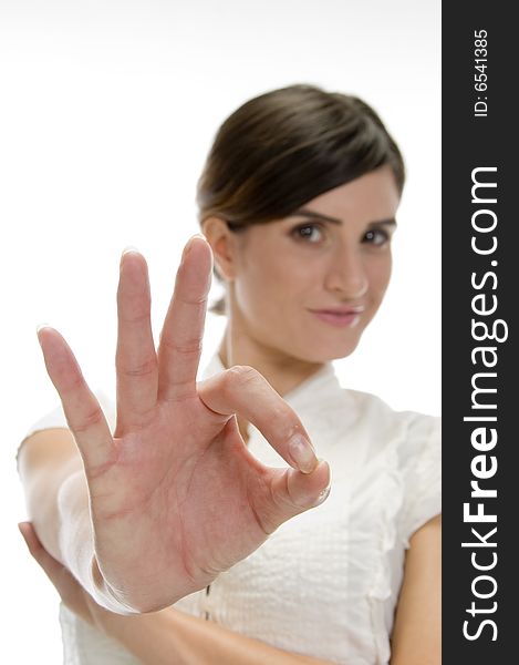 Lady showing ok sign on an isolated background
