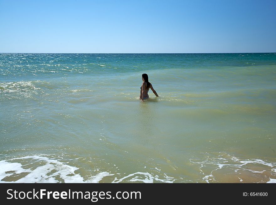 Woman bikini dressed at el palmar beach in cadiz spain. Woman bikini dressed at el palmar beach in cadiz spain