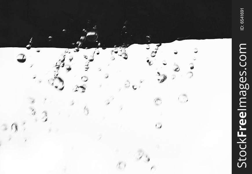 Drops of water fall from edge of a construction