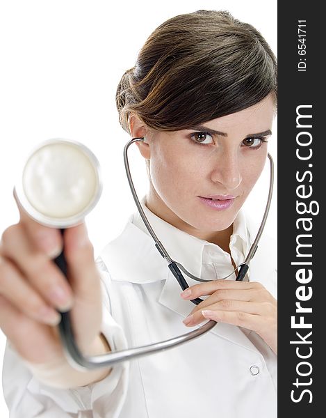 Lady doctor showing stethoscope on an isolated white background