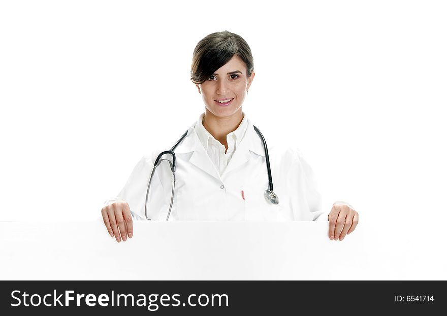 Lady doctor posing with placard against white background