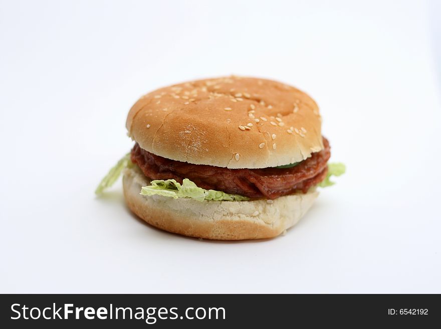 Hamburger with bread close up.