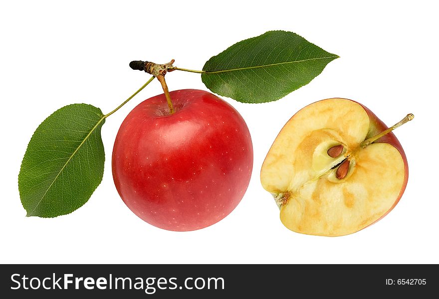 Red apple and half with green leaves isolated over white. Clipping path. Red apple and half with green leaves isolated over white. Clipping path.