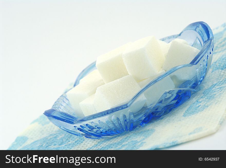 Sugar In A Blue Glass Cup