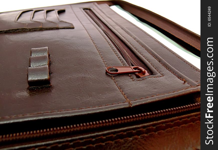 Inside of the brown business briefcase. Close-up. Inside of the brown business briefcase. Close-up.