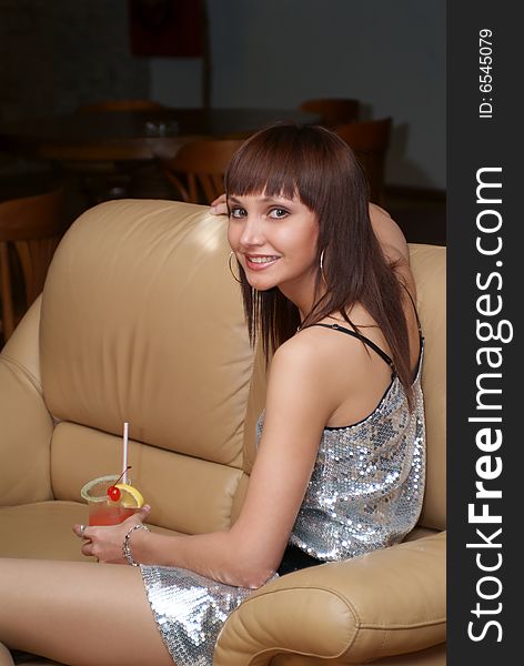 Young woman with cocktail