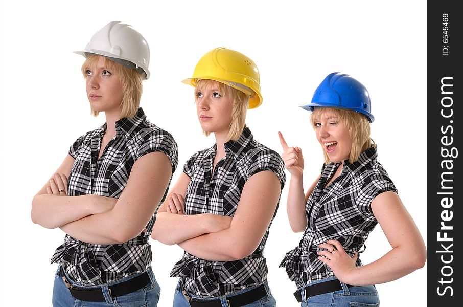 Female construction workers in hard hats