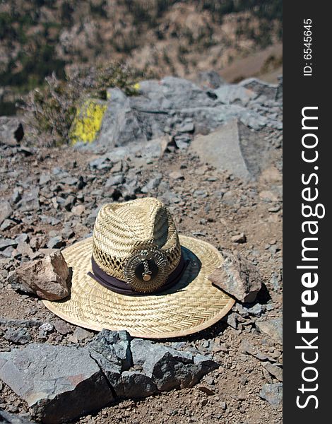 A Peruvian cowboy hat in the rocks of a high mountain. A Peruvian cowboy hat in the rocks of a high mountain.