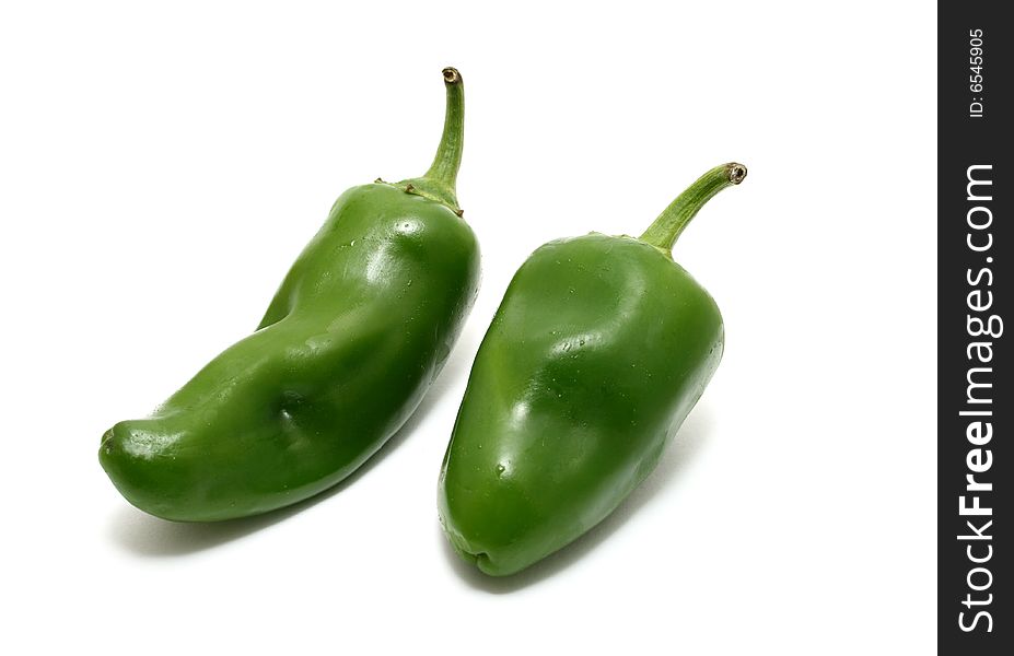 A jalapeño pepper isolated on a white background.