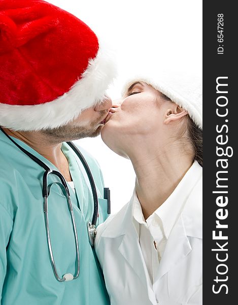 Medical professionals kissing each other with white background