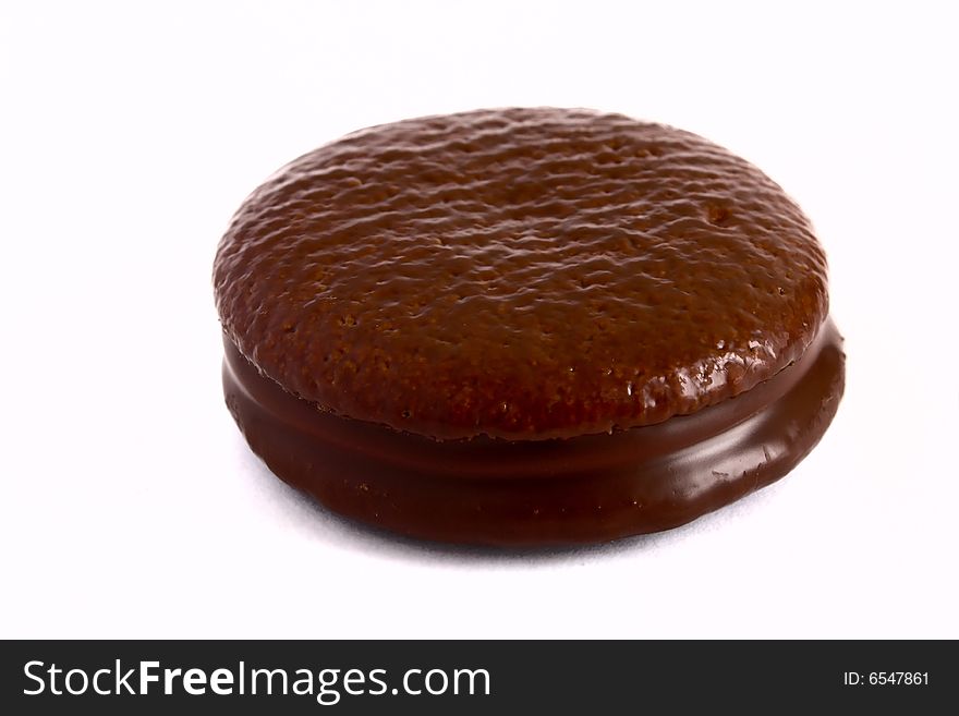 Cookies in chocolate glaze on a white background
