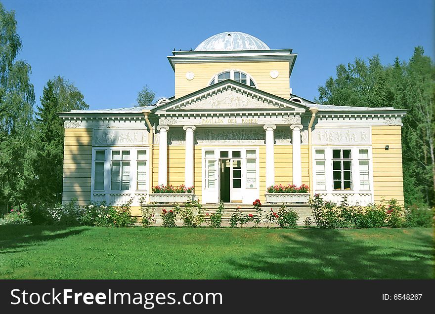 Classical wooden building in front