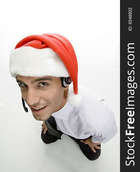 Businessman with headphone and santa cap with white background