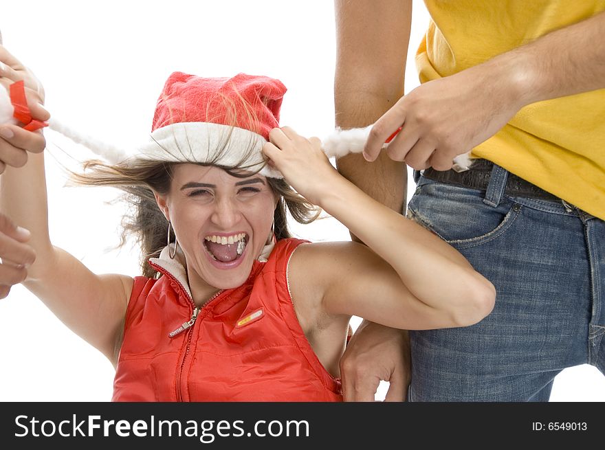 Man pulling cap of woman with white background