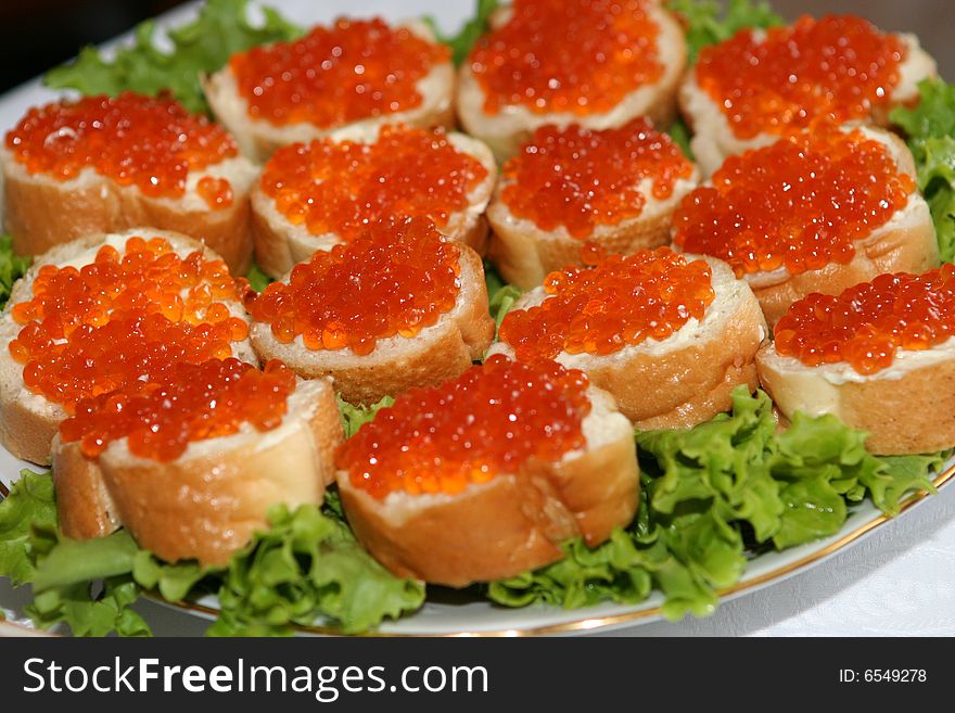 Sandwiches with red caviar.
