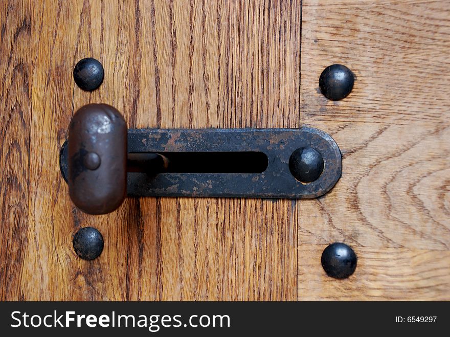 Old latch on a museum door