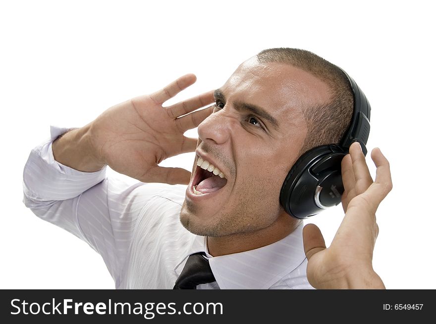 Shouting businessman with headphone on an isolated background