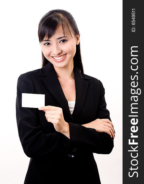 Young pretty successful asian female executive with a white card. Young pretty successful asian female executive with a white card