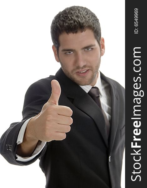 Businessman showing thumb on an isolated background