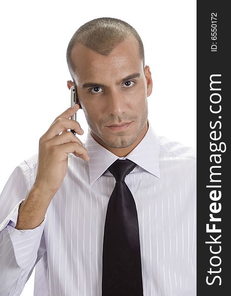 Man with mobile looking to camera on an isolated white background