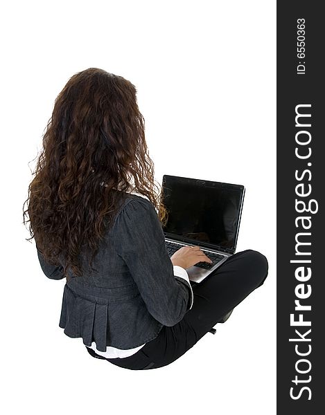 Female busy with laptop on isolated studio  picture