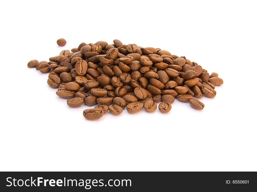 A lot of coffeebeans on a white background