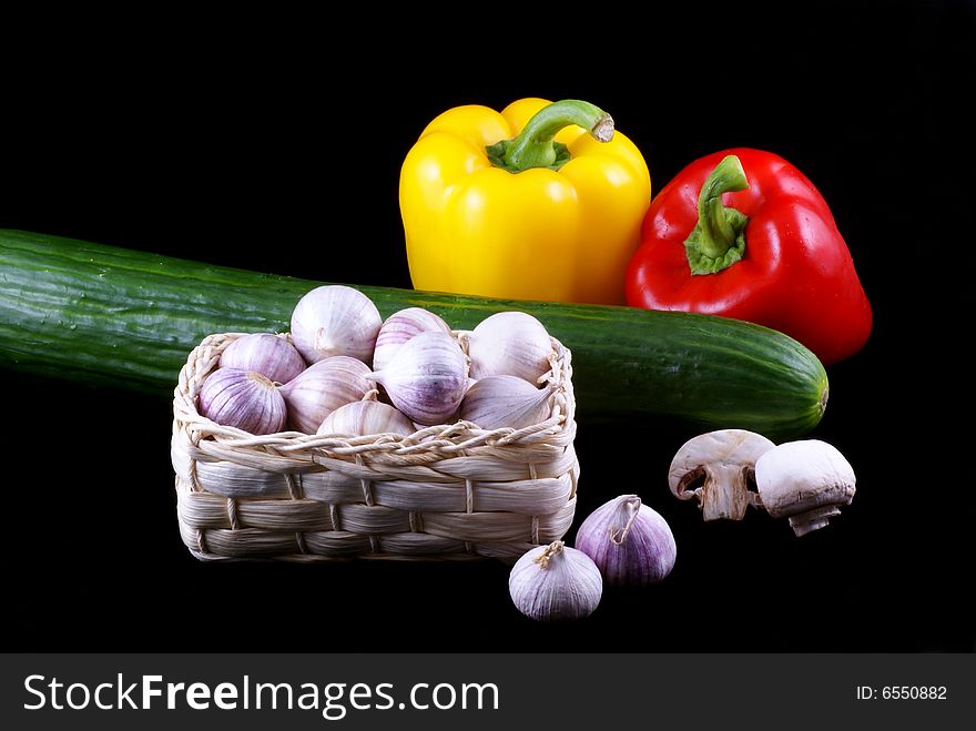 Different kinds of vegetables isolated on a black background. Different kinds of vegetables isolated on a black background.