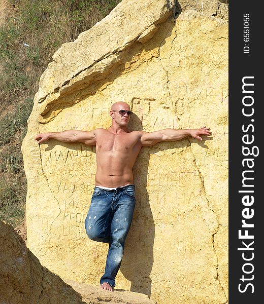 Strong Bald Man With Nude Torso