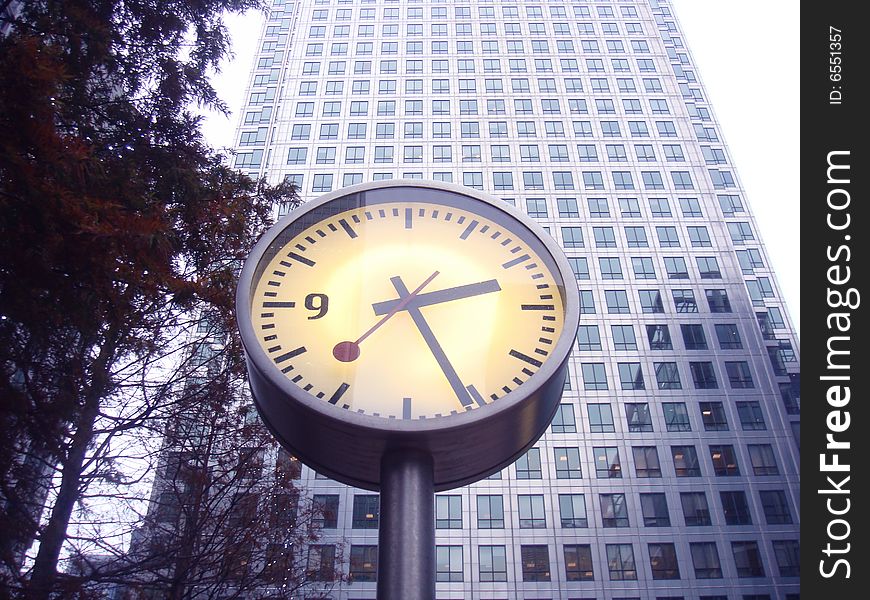 Skyscraper and Clock near Stock Exchange area