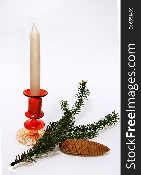 Candle and fur-tree branch and cone. Candle and fur-tree branch and cone