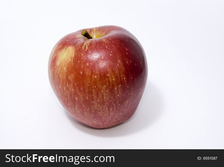 Red fresh apple isolated on white. Red fresh apple isolated on white