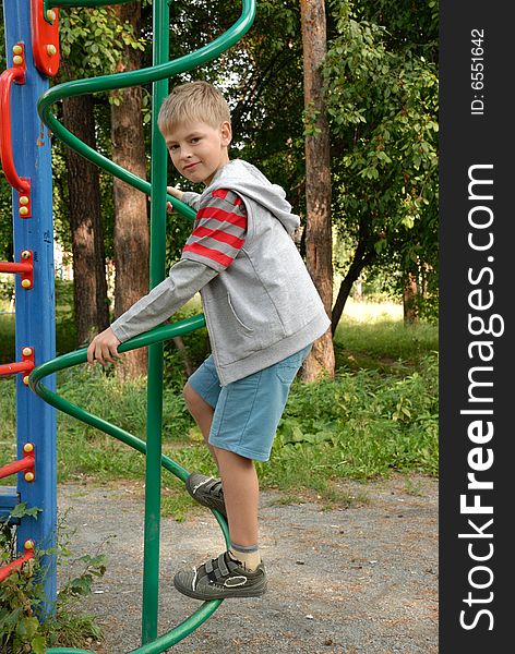 Boy at outdoor sporting,  acting