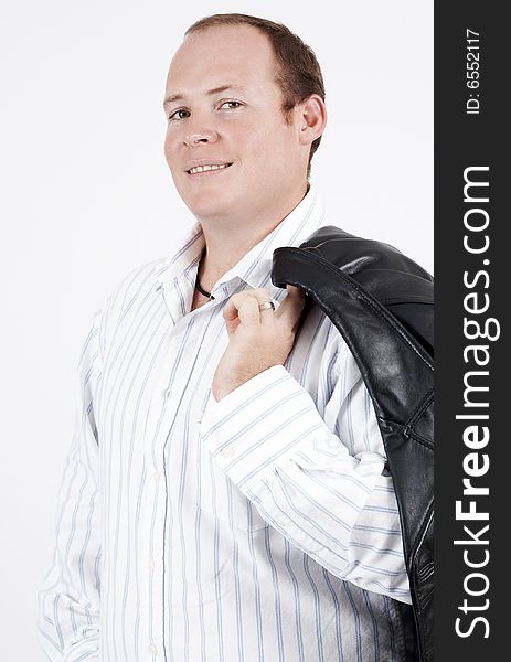 Young caucasian man wearing trendy clothes. On white background