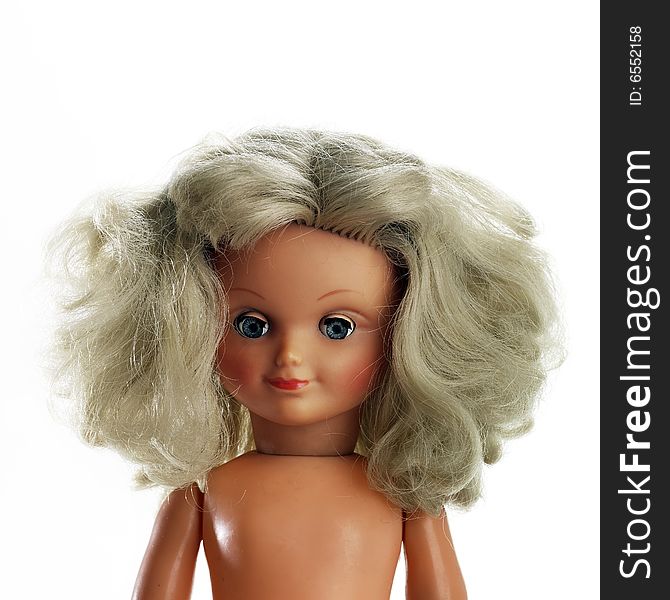 Portrait of blond hair plastic doll  isolated