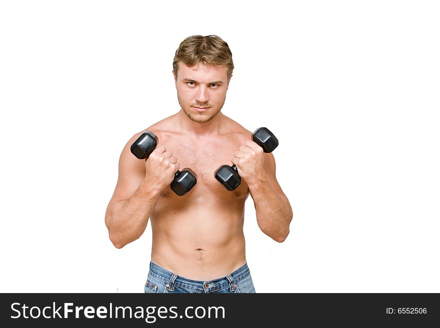 Young man with black dumbbells. Young man with black dumbbells