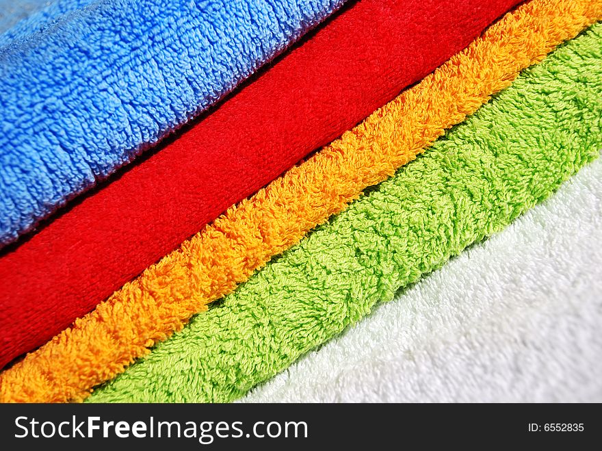Stack of colorful towels close-ups